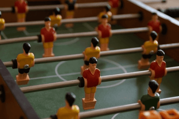 A closeup image of foosball players